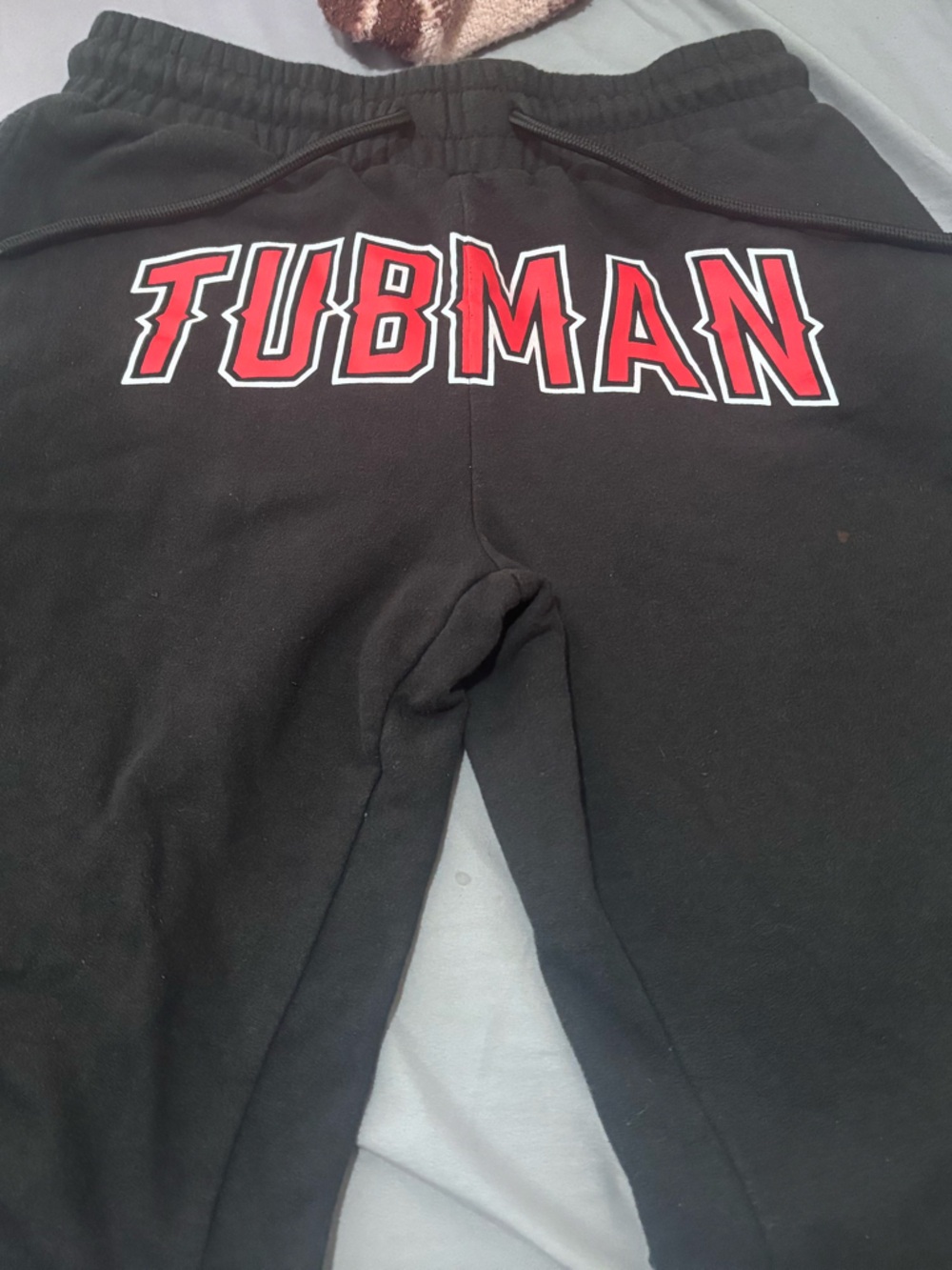 TUBMAN Black Sweatpants with Red Lettering